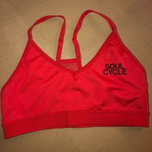 SoulCycle x Nike orange racerback bra